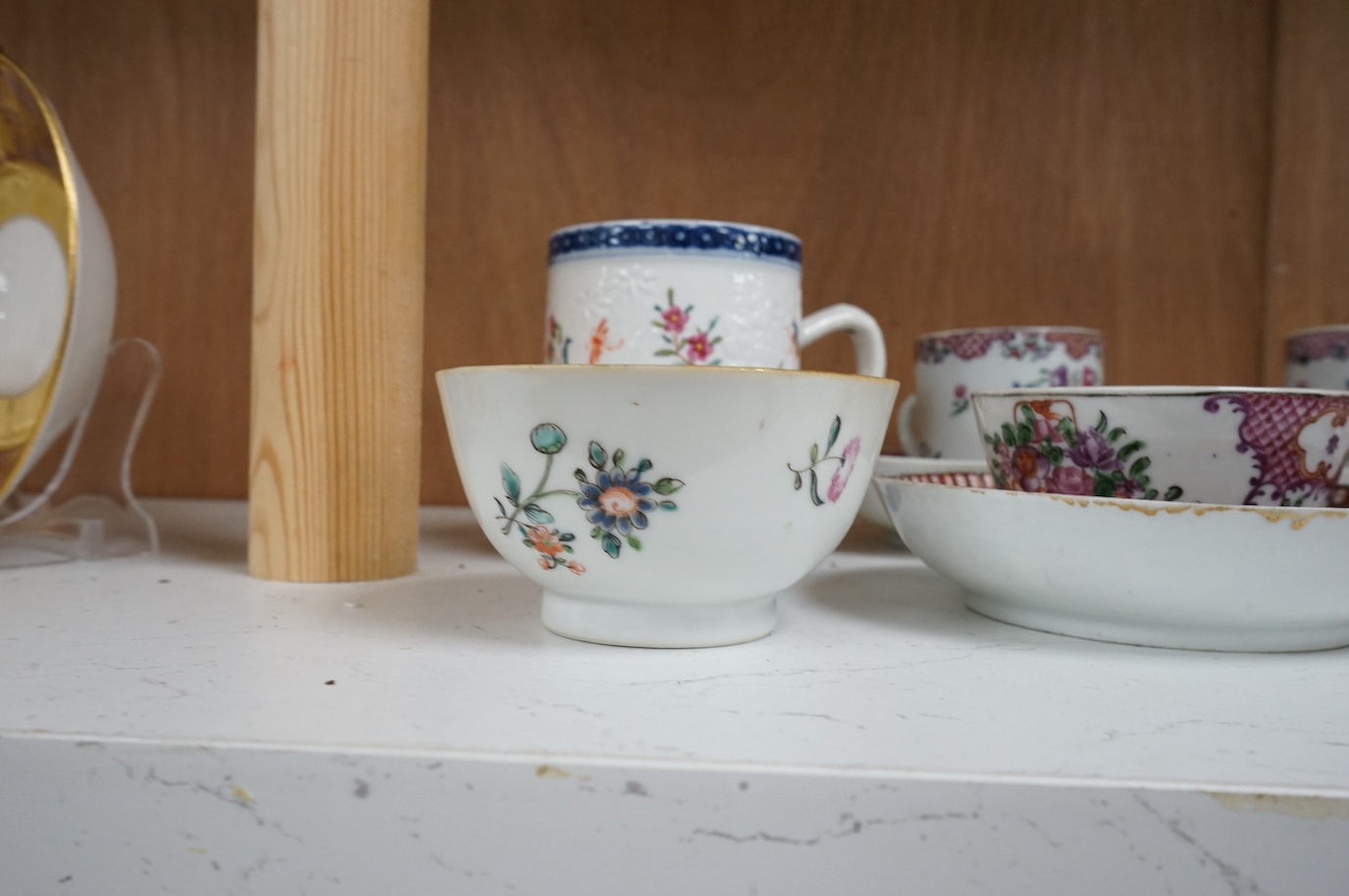A group of 18th century Chinese export tea and coffee cups, saucers and a mug, mug 9cm high